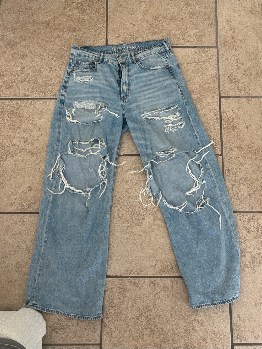 American Eagle Outfitters Light Blue Distressed Ultra Baggy Jeans